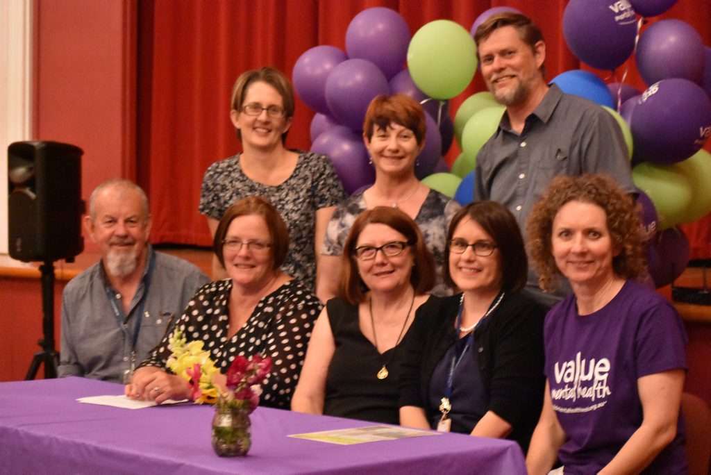 COMMUNITY MINDED: Mental Health Q&A; panellists (Front) Terry Pinney, Mary Woods, Jan Falconer, Melissa Mayoh and Kathryn Walton with hosts Sophia McLucas, Julia Keogh and panellist Mark Carey.